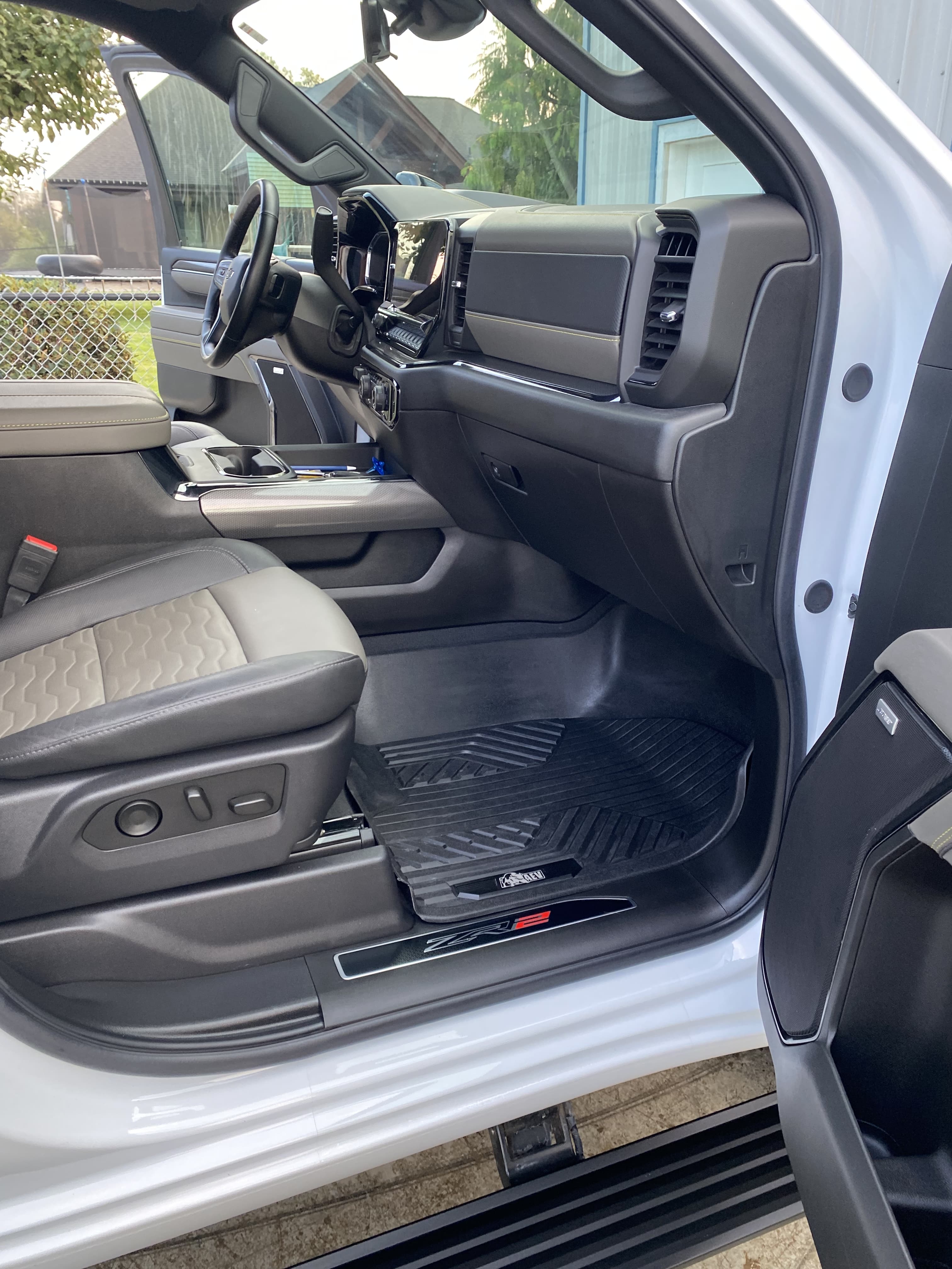 Truck front passenger mat after detailing, clean and dressed